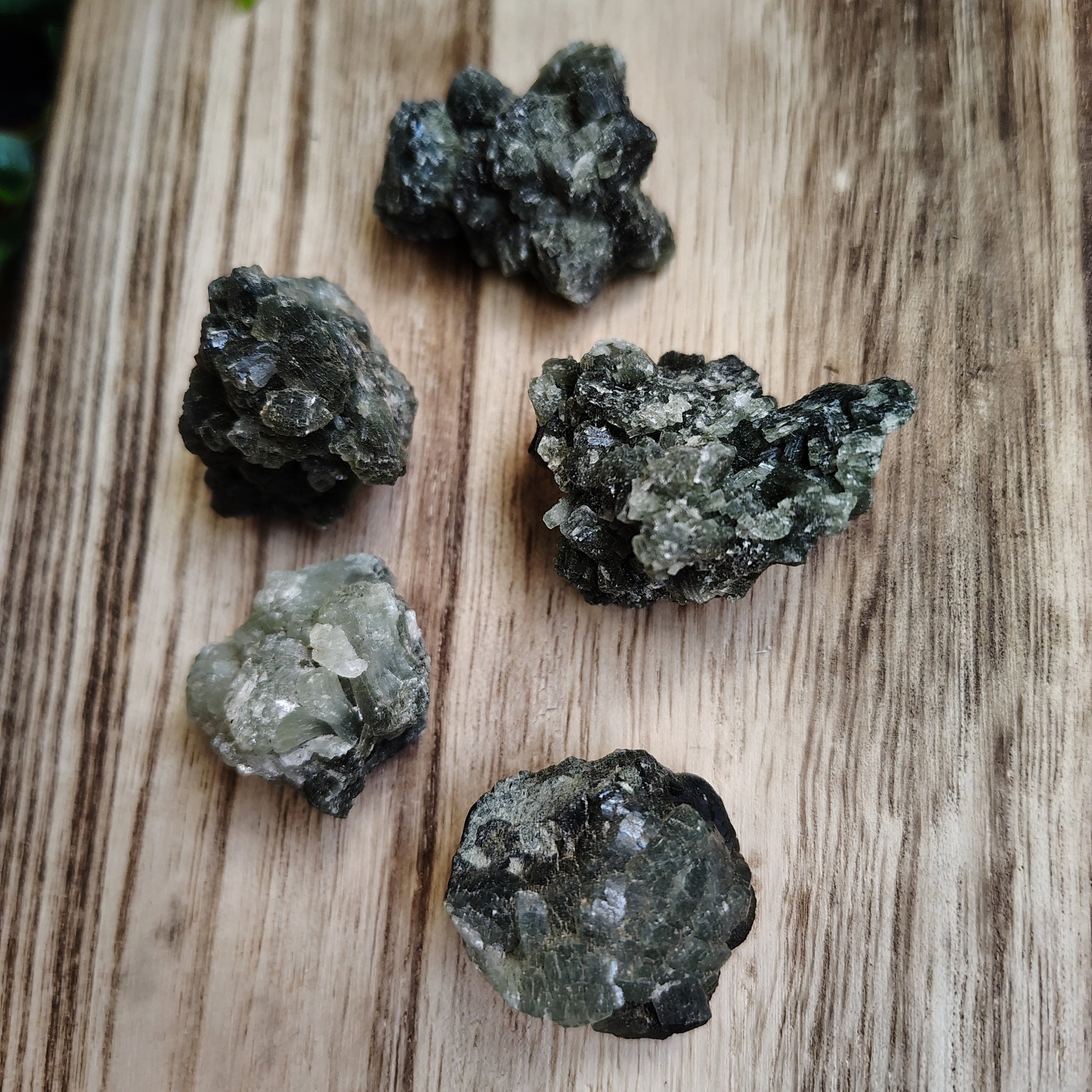 Mineral specimens on a wooden surface